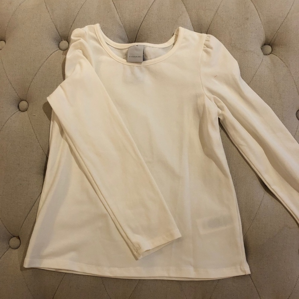 White puff shoulder shirt.